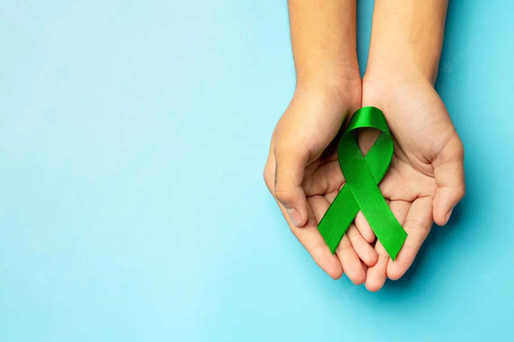 The green ribbon is the international symbol of mental health awareness. Wear a green ribbon to show colleagues, loved ones, or simply those you walk past that you care about their mental health. It can also be worn in memory of a loved one.