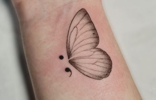 Butterfly depression tattoos can symbolize transformation, renewal, and emerging from the darkness of depression into a state of positive change and growth.