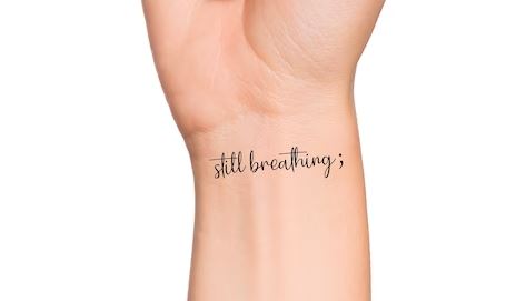 The "Breathe" depression tattoos for bipolar disorder could encapsulate the importance of mindfulness and finding moments of calm amidst the emotional fluctuations and challenges of the condition.