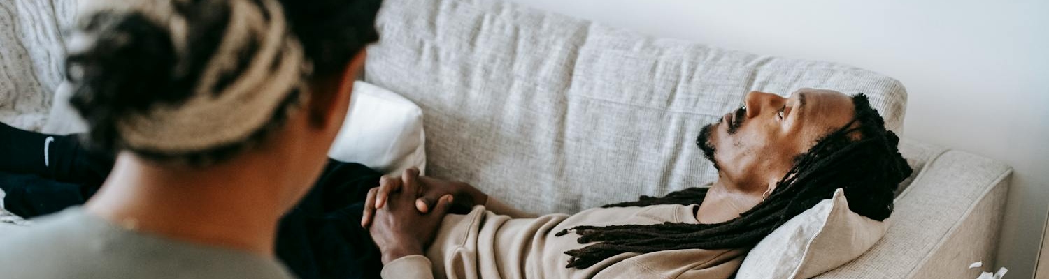 A person talking to a therapist during residential treatment