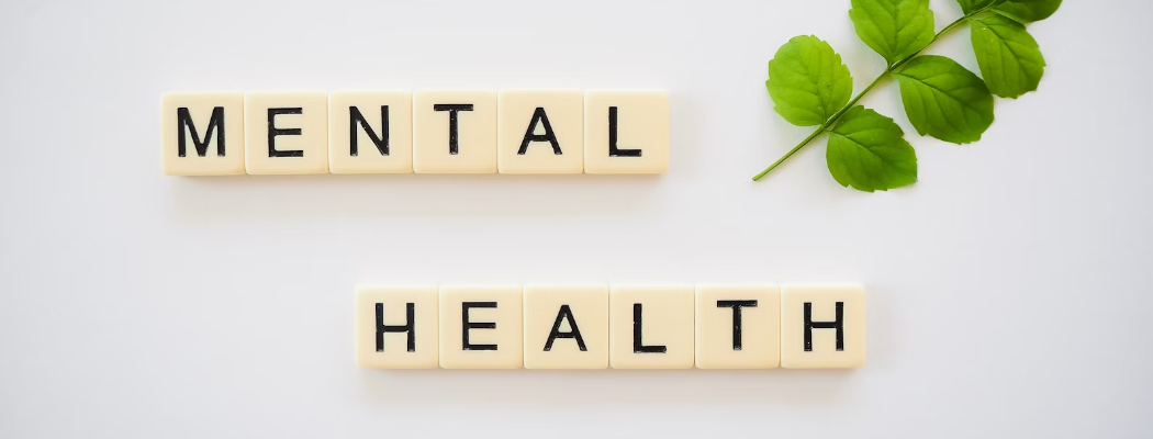 "Mental health" spelled out in wooden blocks.
