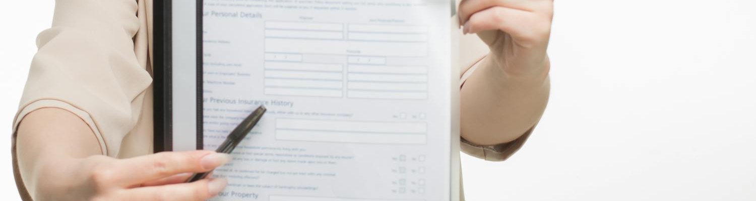 A woman showing insurance policy in inpatient depression treatment Florida.