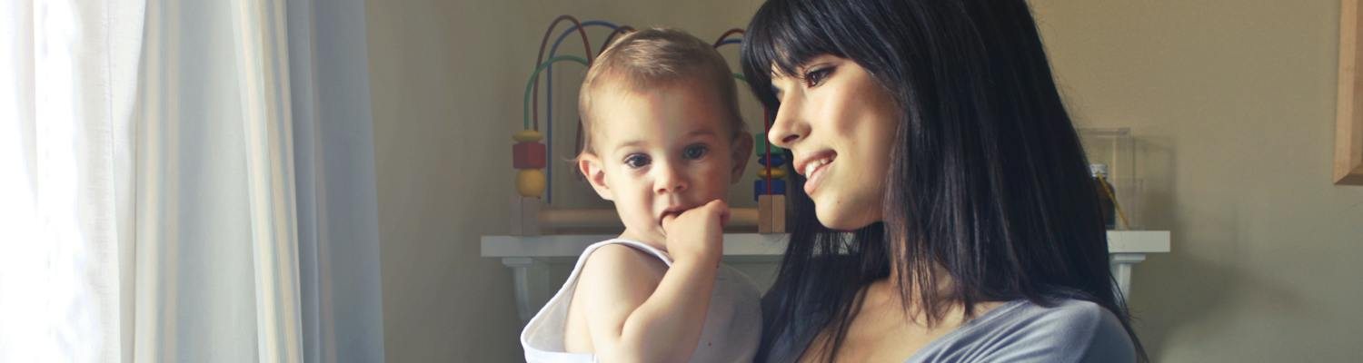 A woman and baby as a symbol of National Women's Health Week