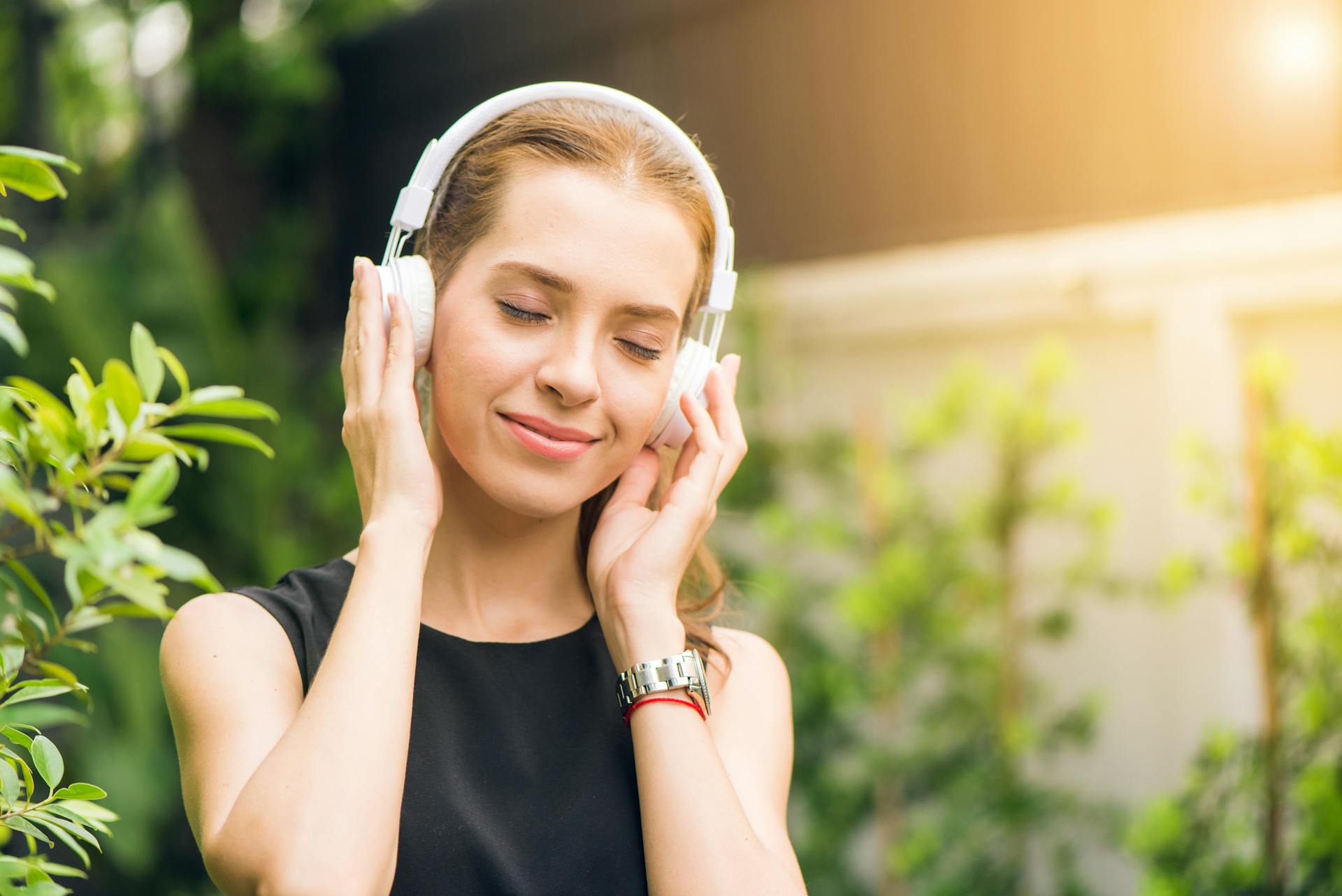 A relaxed and happy person listening to music