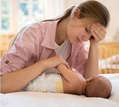 A mother with a baby, as a symbol of how to help your wife with postpartum depression.