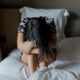 a girl in bed with ADHD and sleep problems